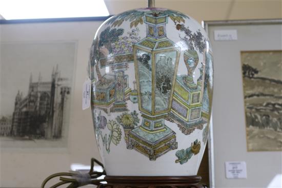 A Chinese famille rose antiques jar and cover, early 20th century, converted to lamp